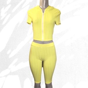 Women May pink yellow bike short set.